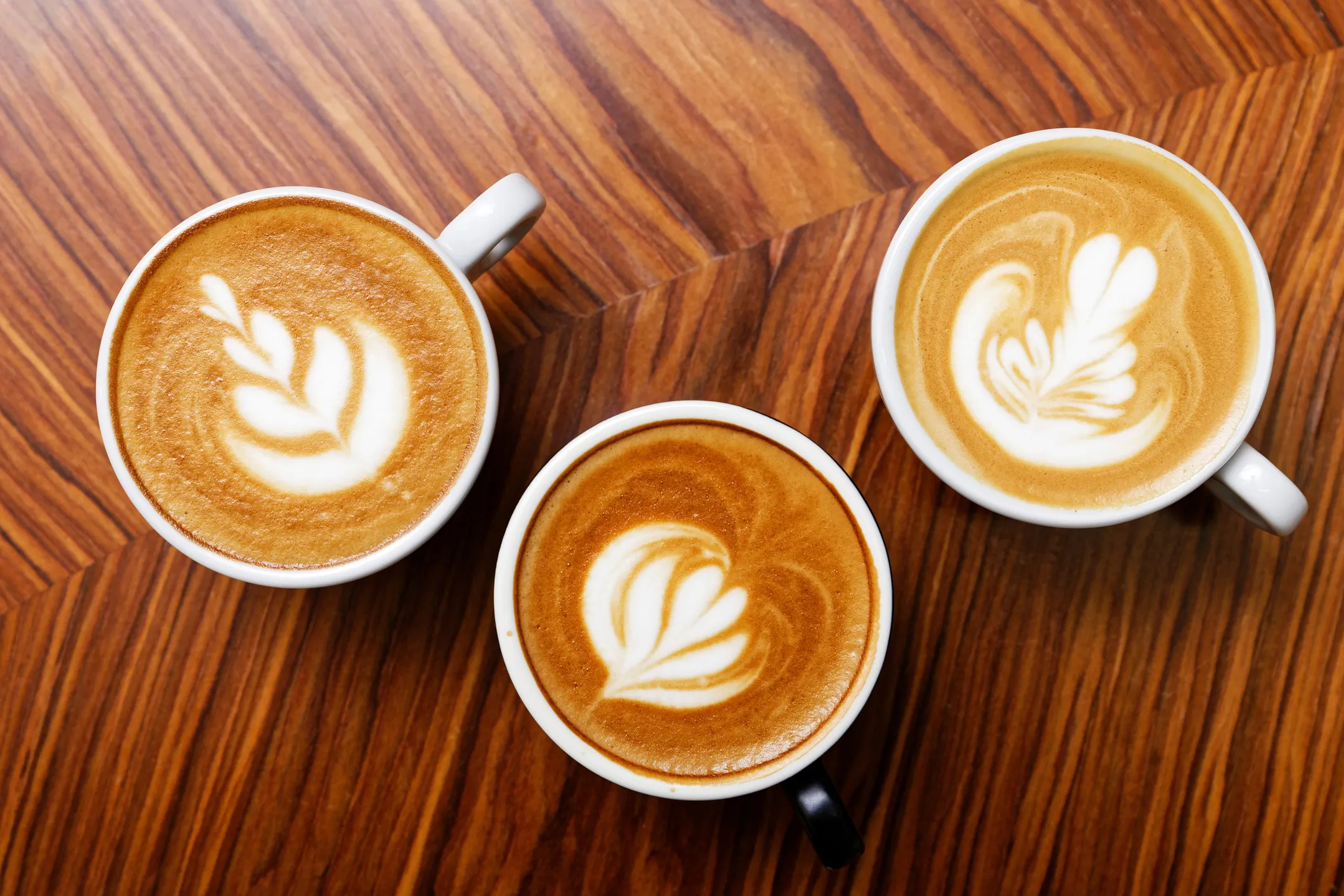 Media _ Image _ 4_3 _ Large Singlecoffee Some foamy coffee with latte art on top